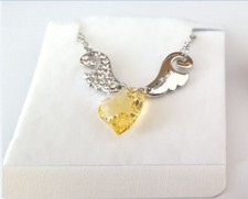 Collier argent aile ange zirconium cœur cristal synthétique jaune i7