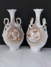 vases anciens en porcelaine de limoges décor de putti, anges, chérubins