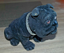 ANCIEN CHIEN BOULEDOGUE NOIR POUR PLAGE ARRIERE DE VOITURE QUI REMUE LA TETE .