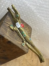 casse noix  alligator, laiton