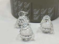 Figurine en cristal Swarovski 209588 3 pingouins de 3 cm chacun. Avec...
