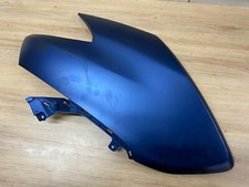 UN CARENAGE PLASTIQUE LATERAL