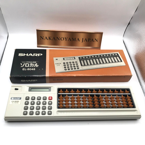 Calculatrice sharp 8048 - jp,