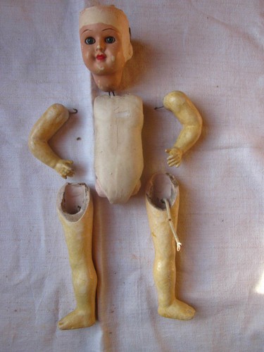 Poupée ancienne à - (xixè),