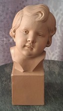 Buste d'enfant en terre cuite  signé D. DANIEL et numéroté 92
