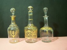 carafes soufflées en cristal,dorées  a l'or(cave a liqueurs)lot de 3