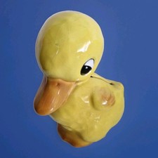 figurine tirelire canard en