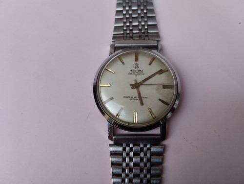 Ancienne montre mecanique - ancienne,
