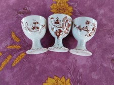 3 Coquetiers anciens Terre de Fer en Faience Signés HB Décor Floral Sépia