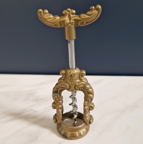 Ancien tire bouchon bronze - en,