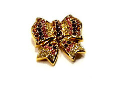 Bijou alliage doré et strass broche nœud signée Nina Ricci brooch