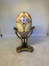 ANCIEN OEUF EN FER DECORE SUR BRONZE AVEC TETE DE DRAGON