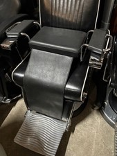 Coussin rehausseur pour fauteuil de coiffeur