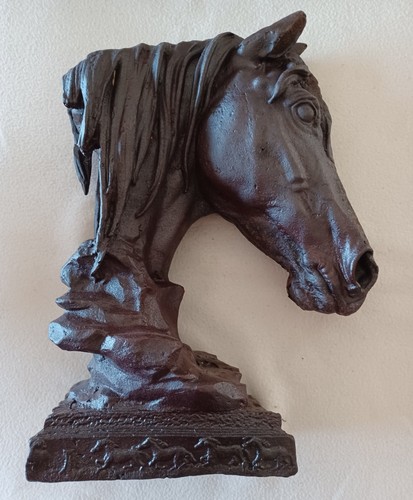 Tête cheval fonte - en,