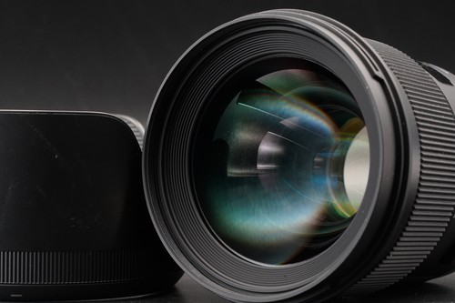 Objectif sigma 1 - sigma, dg