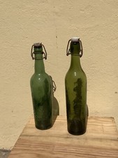 2 Bouteilles anciennes verre