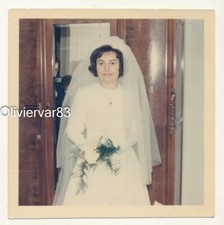 Vintage photo - pretty young woman in wedding gown