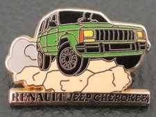 PIN'S ARTHUS BERTRAND - Voiture Jeep Cherokee Renault 4x 4 vert