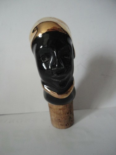 Bouchon ancien avec personnage