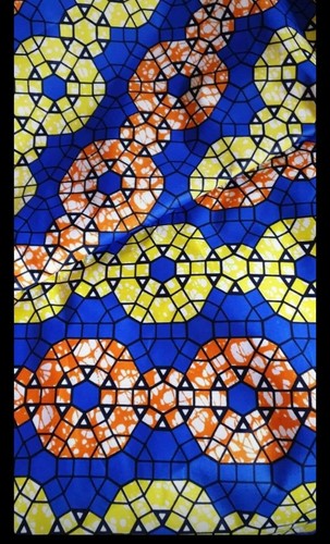 Tissu wax motif orange jaune
