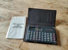 Calculatrice de poche OLYMPIA  avec notice d'utilisation