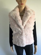 veste rose sans manches en