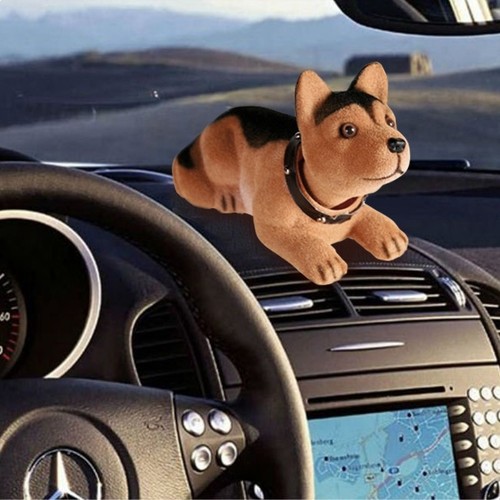 Chien pendulaire voiture remue