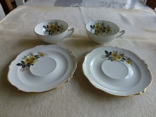 DEUX PETITS-DEJEUNER EN PORCELAINE DE LIMOGES