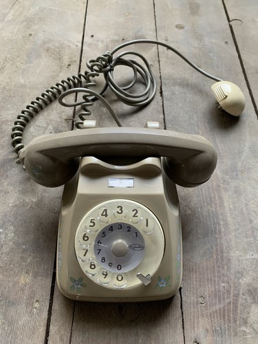 Téléphone disque face - à,