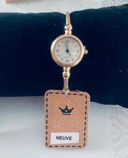 montre femme fantaisie doré cadran rond neuve