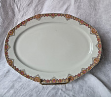 Plat ovale en porcelaine de Limoges Bernardaud Art Déco