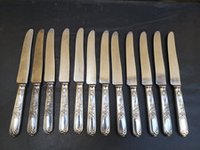 Suite 12 grands couteaux anciens métal argenté lame inox Très bon état