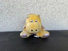 Peluche hippopotame jaune assis