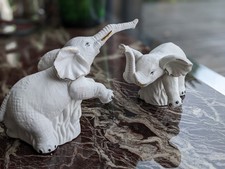 Art Déco : duo d'éléphants en biscuit / porcelaine blanche