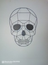 Masque murale en métal en