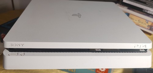 Playstation slim blanche - 4,