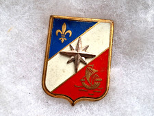 Un insigne militaire " 3°