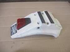 Garde boue arrière + feu pour