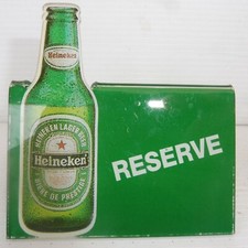 PANCARTE DE TABLE HEINEKEN RESERVE PLASTIQUE - 7,5 cm x 8 cm de H a la bouteille