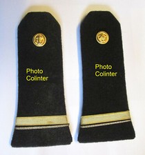 pair of rigid shoulder pads