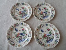 SUITE DE 4 ASSIETES À DESSERT