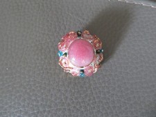 broche ronde en émaux de