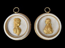 A Pair Of Late Louis XVI Ormolu Mounted and White Marble Portrait Medallions