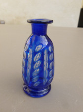 flacon ancien en verre bleu