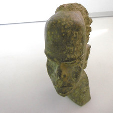 tete africaine sculptée en