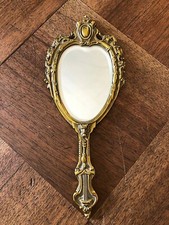 JOLI MIROIR A MAIN EN BRONZE