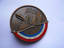 broche  ECOLE DE SKI FRANCAIS AIGLON BRONZE