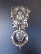 Ancien heurtoir ou anneau d' attache chien en fonte poli,forme  tète de chien