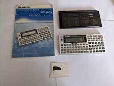 sharp pc 1403 s'allume, les touches fonctionnent calculator calculatrice