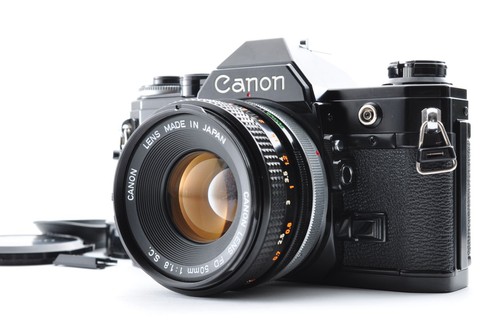 Canon noir objectif - /,
